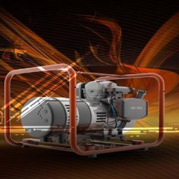Bright orange background with wavy images and portable power generator in center of display